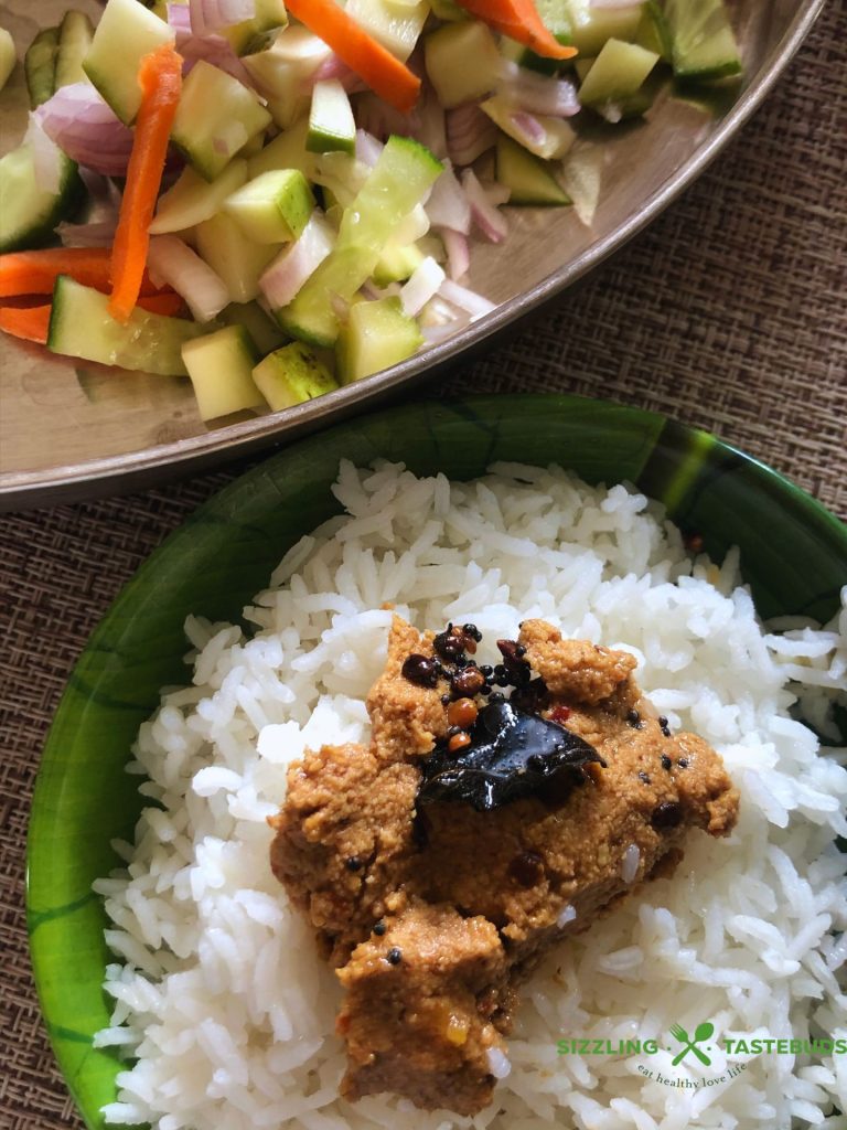 Paruppu Thogyal is a spicy, tangy South Indian Lentil Chutney. Served with hot steamed rice and sesame oil