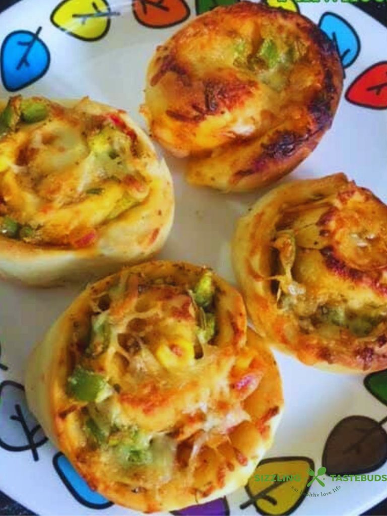 Pizza pinwheels are customizable, cheesy spirals of dough—perfect as a fun, saucy appetizer, snack, or lunchbox treat.
