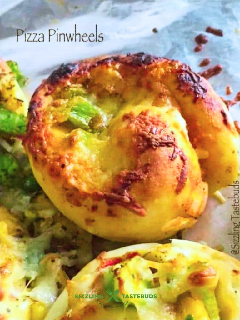 Pizza pinwheels are customizable, cheesy spirals of dough—perfect as a fun, saucy appetizer, snack, or lunchbox treat.