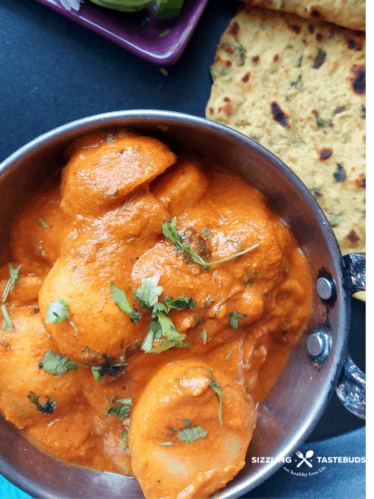 Punjabi style Dum aloo is a low fat, Gluten Free and Vegan Punjabi style gravy with Baby Potatoes, served with flatbread or steamed rice.