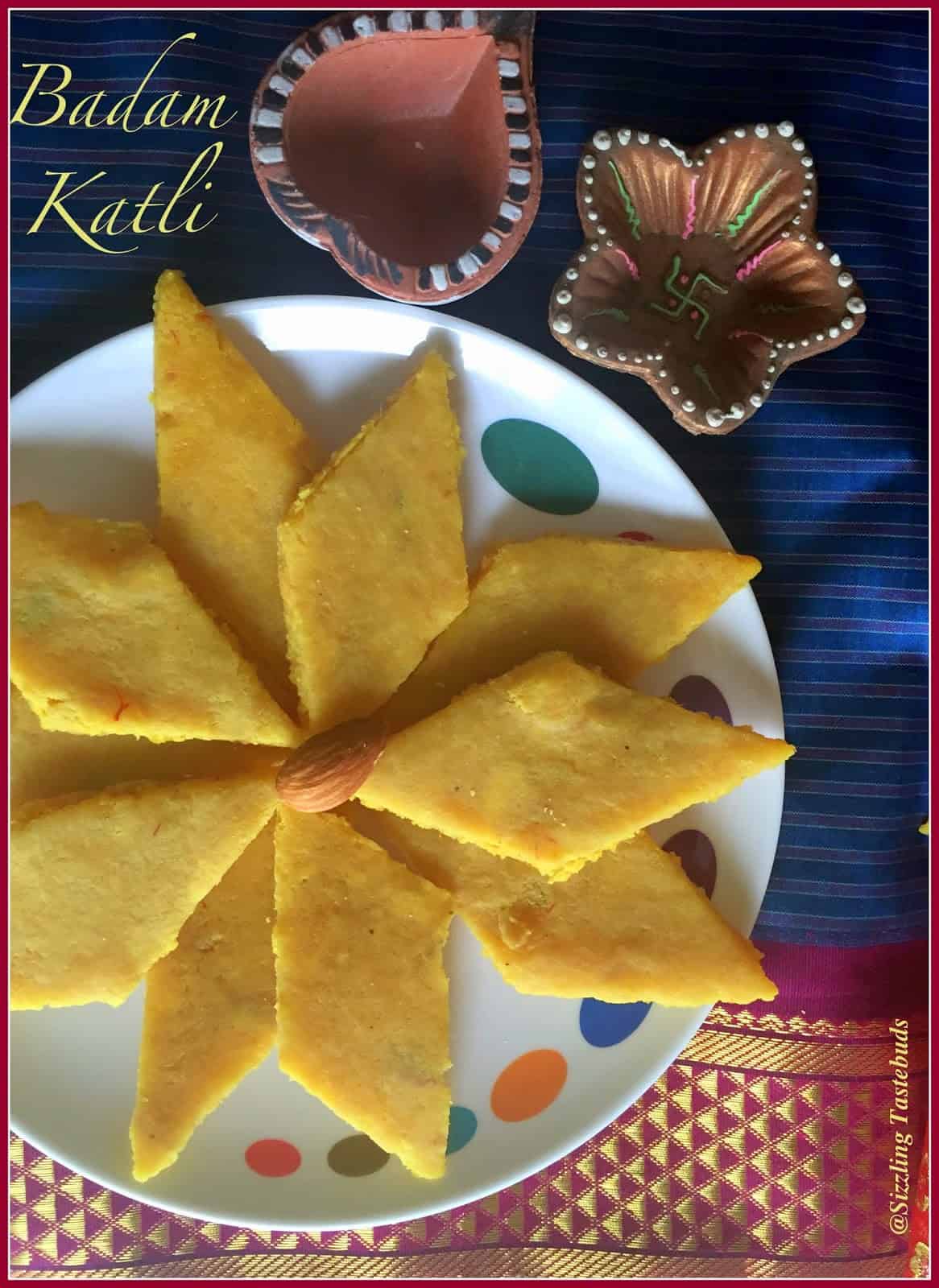 Badam Burfi or Almond Fudge is a delicious and irresistible sweet made from Almond meal, sugar. This makes for a quick treat for sweet tooth or during Diwali too!