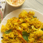 Let’s make this delicious and quick Pressure Cooker Veg Biryani that goes so well with raita / salad / papad for brunch or office / school lunchboxes too. Or a #potluck too !