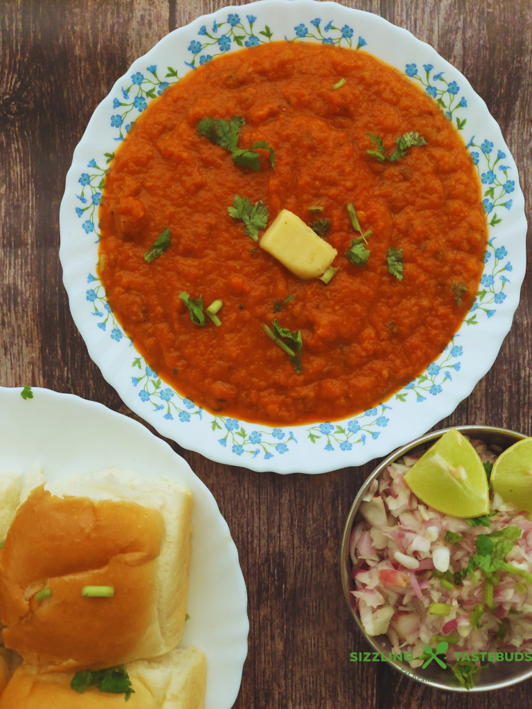 Instant pot Pav Bhaji is a quick, delicious take on the popular Indian Street food. Served with warm dinner rolls / pav and garnish for a sumptuous brunch, snack or dinner.